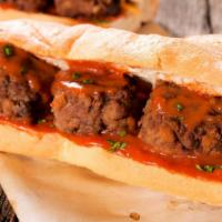 Meatball Parmigiana Grinder · Melted and Fresh Mozzarella and Marinara Sauce on a delicious grinder. Served with a side of...