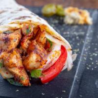 Chicken Souvlaki Wrap / Sandwich · Marinated grilled chicken, homestyle pita bread and delectable Greek salad, served in a wrap...