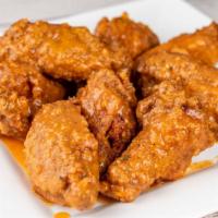 Flavored Wings (10) · 8 Juicy and tender wingettes golden fried and bathed in your choice of sauce (Buffalo, Honey...