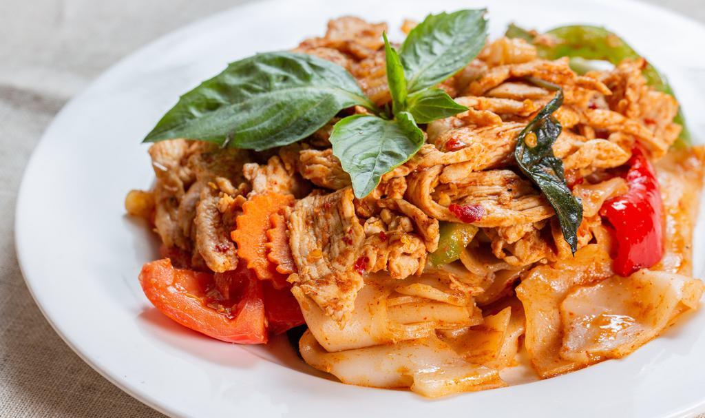 Drunken Noodle · Stir-fried broad rice noodle with bell pepper, carrot, onion, tomato and basil in basil chili sauce