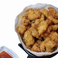 Chicken Popcorn · Fried marinated chicken served with sweet chili sauce