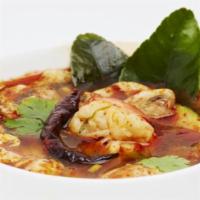 Tom Yum Koong Small · Shrimp, mushroom and scallion in lemongrass soup.