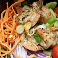 Grilled Shrimp Salad · Grilled shrimp, lettuce, red onion, green onion, cucumber, tomato, carrot topped with crispy...
