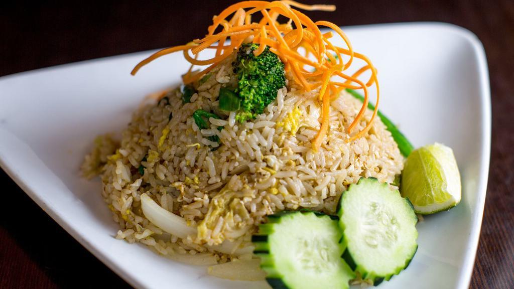 Thai Fried Rice · Stir-fried rice with onion, scallion, tomato, carrot, and egg.