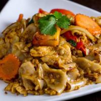 Drunken Noodles · Stir fried broad rice noodle with bell pepper, carrot, onion, tomato, and basil in basil chi...