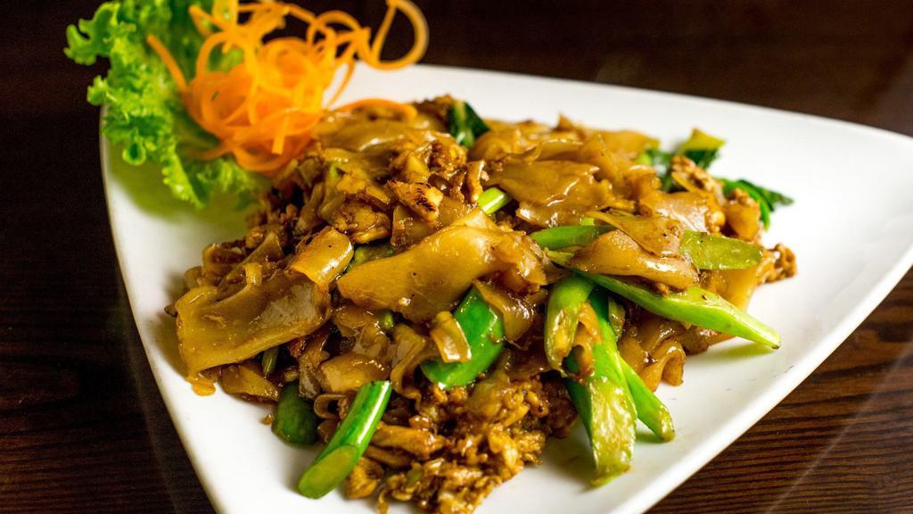 Pad See Ew · Stir fried broad rice noodle with egg and Chinese broccoli in black bean sauce.