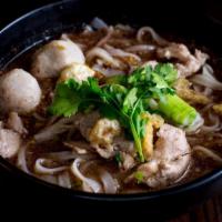 Pork Noodle Soup · Noodles with sliced pork, pork ball, bean sprout, scallion, fried pork skin and cilantro in ...