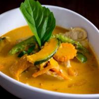 Thai Pumpkin Chicken Curry · Red curry with chicken, pumpkin, bell pepper, carrot and basil in coconut milk. Spicy.