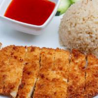 Heaven Chicken · Crispy chicken over ginger rice served with cucumber and sweet chili sauce.