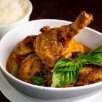 Rambutan Duck Curry · Half crispy duck with cherry tomato, rambutan, bell pepper, pineapple, carrot and basil in c...