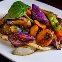 Basil Eggplant · Sauteed eggplant with onion, scallion, carrot, bell pepper and basil in spicy chili basil sa...