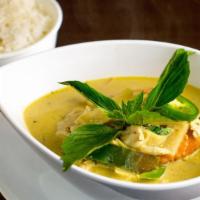 Green Curry · Green curry with bamboo shoot, bell pepper, carrot, and basil in coconut milk. Spicy