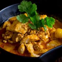 Massaman Curry · Massaman curry with onion, potato and peanut in coconut millk.