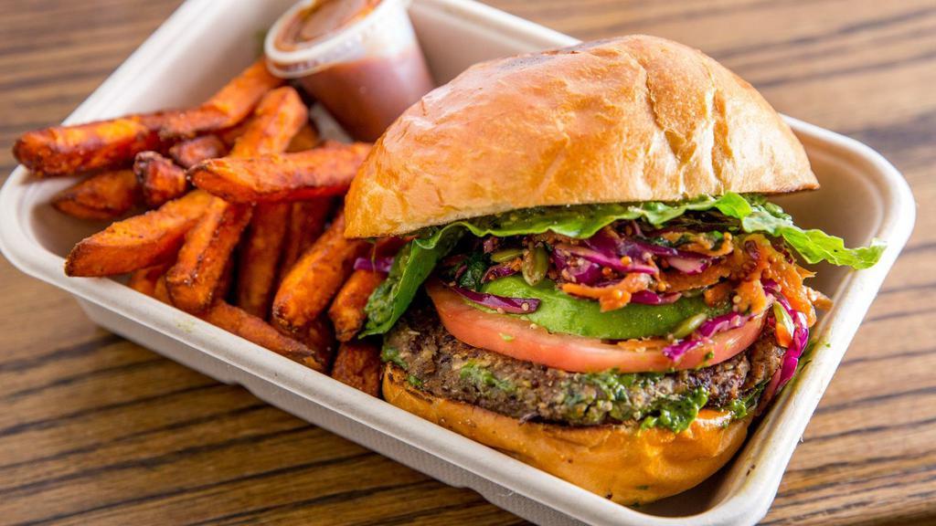 Veggie Quinoa Black Bean Burger · Veggie patty consisting of cauliflower, quinoa, black beans, carrots. Choice of basil pesto or curry ketchup. Includes avocado, and choice of cheese. Served on a Bien Cuit brioche bun. Come with a choice of a side. 

Choice of side with burger.