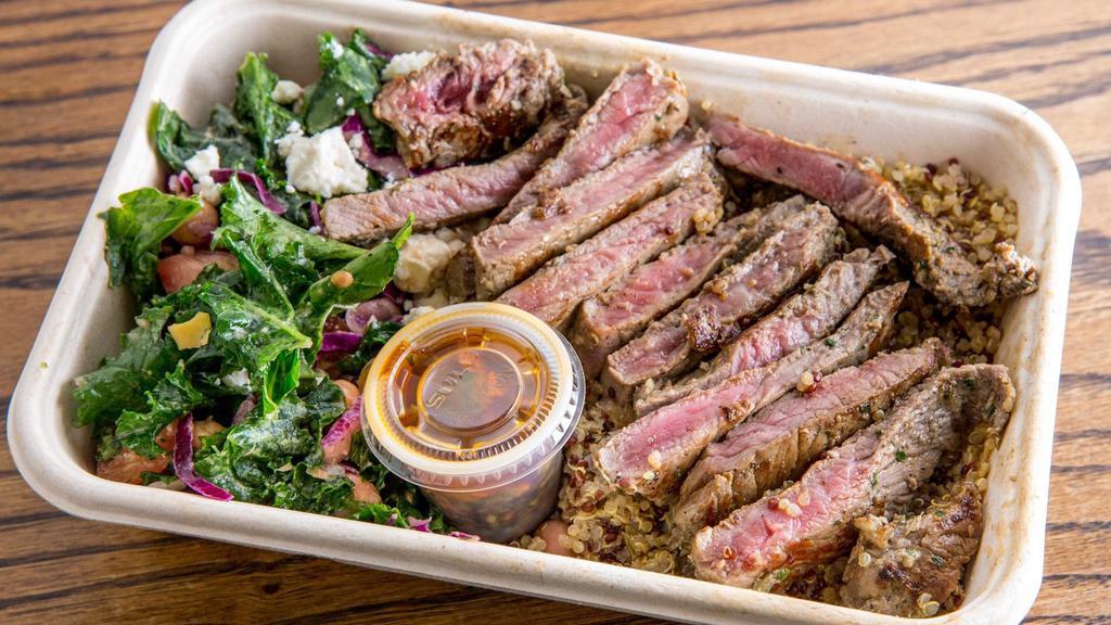 Angus Steak Bowl · Grass-fed grilled New York Strip loin steak, served with chimichurri  sauce, choice of grain and of side.

Additional toppings available.