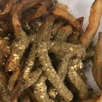 Za'Atar Fries · Crispy fries tossed in za'atar (thyme and sesame dip) these are surely to become a favorite!