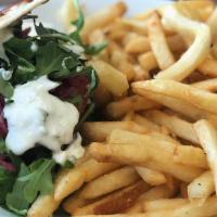 Kefta Lamb Burger · Grass-fed lamb, onion, parsley and herbs topped with red cabbage slaw, garlic yogurt sauce s...