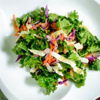Kale Salad · Fresh kale sautéed in a coconut, garlic sauce