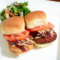 Chicken Or Steak Sliders · A pair of vegan sandwiches served with garden salad or fries