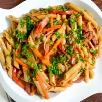 Rasta Pasta · Penne Pasta mixed with bell peppers, carrots, and a creamy coconut jerk sauce