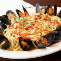 Mussels · Served with a choice of linguini, penne or vegetable. Bread included.
