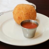 Rice Ball · Sicilian style filled with ground meat and peas.