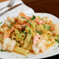 Shrimp Scampi · Served with a choice of linguini, penne or vegetable. Bread included.
