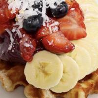 Waffle Package · Hot Belgian Waffle, topped with a cool scoop of the blend of your choice, strawberries, bana...