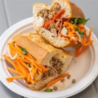 Classic Sandwich · Pate, Vietnamese ham, roasted ground pork with mayo, butter, cucumber, julienne carrots and ...