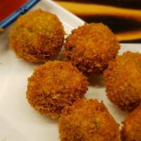 Crispy Fried Vegetable Ball (6 Pieces) · Deep-fried mixture of green soybeans, sweet corn, celery, potato, carrot and kale