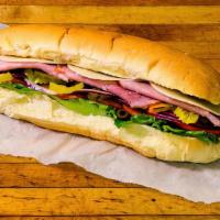 Ham Sub · Lettuce, tomato, onion, hot pepper relish, cheese, banana peppers, pickle slices and olives.