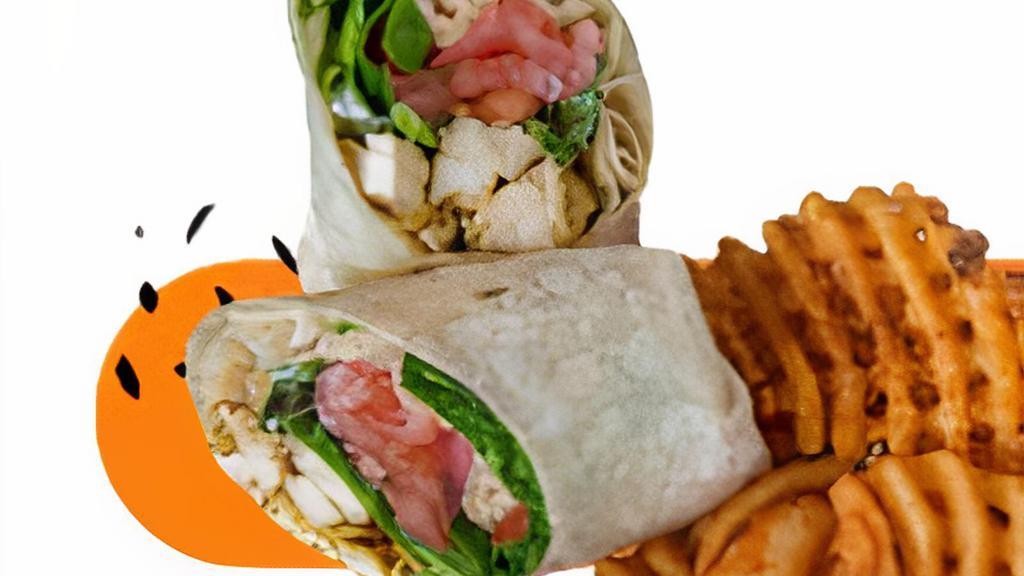 Chicken Caesar Wrap · Grilled chicken served over lettuce, tomato, onions, shaved Parmesan cheese and Caesar dressing.