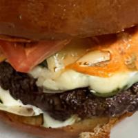 Mexican Burger · 5 oz halal beef patty made fresh with sautéed onions, jalapenos, pepper jack cheese, and spi...