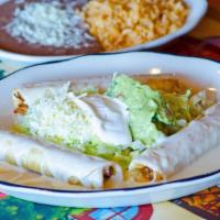 Chicken & Cheese Flautas · Three flour tortillas rolled and stuffed with chicken, deep fried with cheese sauce on top w...