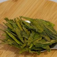 Dragon Well / Long Jing Green Tea · Spring 2022 Harvest.  Made from tender and sweet leaves,  this tea has a very delicate balan...