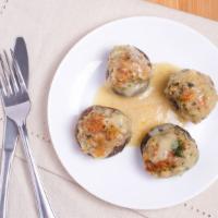 Stuffed Mushrooms (Tg) · Stuffed with ground sausage and fresh herbs, topped with white wine sauce.