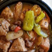 Chicken Scapariello (Tg) · Sauteed boneless breast of chicken with sausage, peppers, onions and potato with pepperoncin...