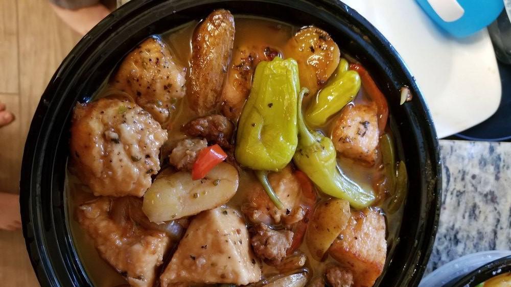 Chicken Scapariello (Tg) · Sauteed boneless breast of chicken with sausage, peppers, onions and potato with pepperoncini in a sherry wine sauce.