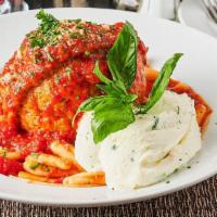 Veal Meatball Dinner (Tg) · Giant veal meatball served over cavatelli pasta with ricotta cheese.