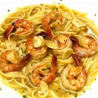 Shrimp Scampi Over Pasta · Shrimp sautéed in garlic butter and white wine.