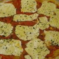 Margherita Pizza · Topped with fresh mozzarella, tomatoes, basil, and garlic.