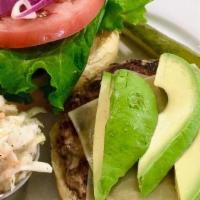 Turkey Avocado Burger · Our Homemade turkey burger topped. with white cheddar, avocado. Lettuce, tomato, red onion. ...