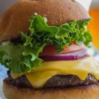 Cheeseburger · 8 0z Burger choice of cheese with lettuce, tomato, red onion. Served on a Soft Roll