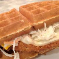 Omg! Chicken Waffle Sandwich · Fried chicken cutlet topped with cole slaw, American and mozzarella cheese between a belgian...