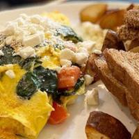Popeye Omelet · Spinach, feta, tomatoes. Served with homefries and toast