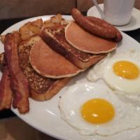 Big Daddy · Two eggs any style, two pancakes, two slices of French toast, bacon, sausage and home fries