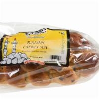 Raisin Challah · Loved by many, our fresh baked braided raisin challah is a beautiful addition to any tableto...