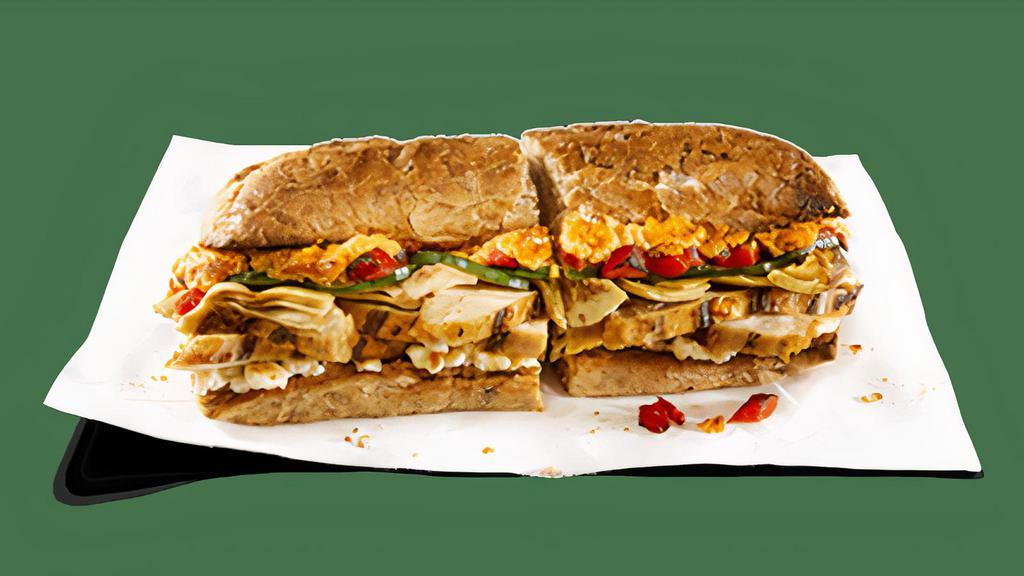 Mediterranean · All-natural grilled chicken, feta, zesty hummus, artichoke hearts (where available), roasted red peppers, cucumbers (can be made vegetarian)