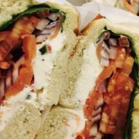 Nova Lox Sandwich · All master smoked fish sandwiches include lettuce, tomato, Bermuda onion, plain or lite crea...