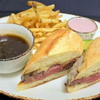 Prime French Dip* · warm roast beef, sharp white cheddar cheese, toasted parmesan baguette, au jus      1400/105...